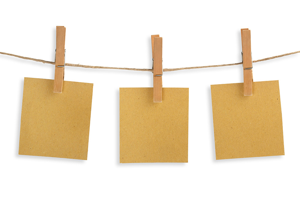 Clothes line string and clothespins holding index cards